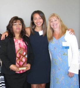 Familias Unidas, an LCSNW family center in Everett, WA recently received the "ChangeMaker" Award for it's program Promotoras de Salud, which provides health services and information to low income Latinos in Snohomish County. Pictured with the award are (left to right) Community Health Worker, Yolanda Estrella, Family Support Specialist Stephanie Pimienta and Program Director Crisann Brooks.