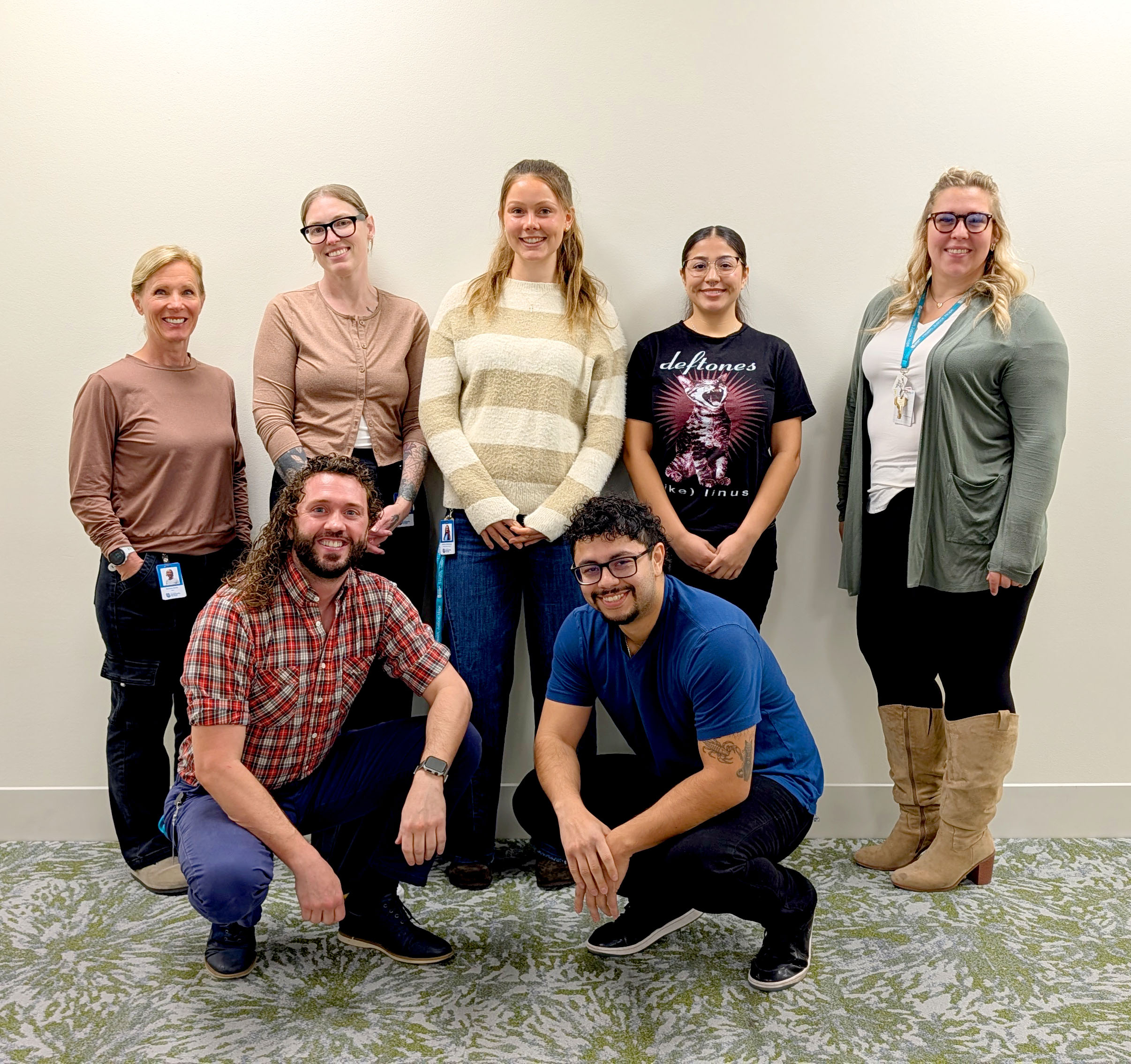 Group of 7 Tri-Cities interns pose smiling